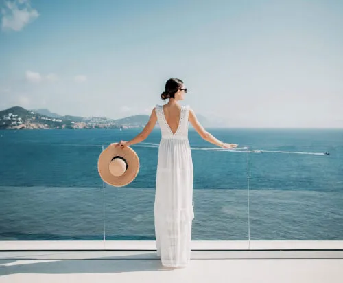 Bride in white dress at 7Pines Hotels with ocean view