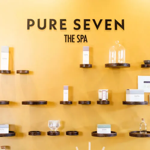 Pure Seven Spa at 7Pines with eco-friendly ethos, showcasing ESPA products on shelves